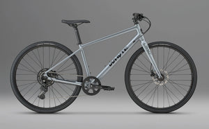 Whyte RHeO 0 hybrid bike in dark silver, drive-side profile on a grey background.