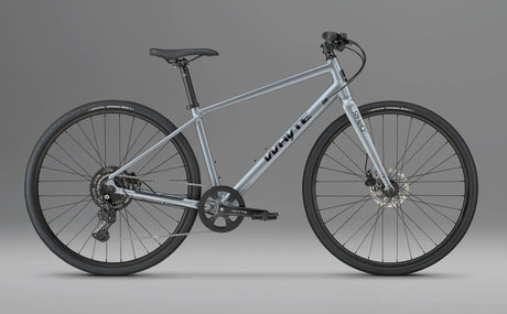 Whyte RHeO 0 hybrid bike in dark silver, drive-side profile on a grey background.