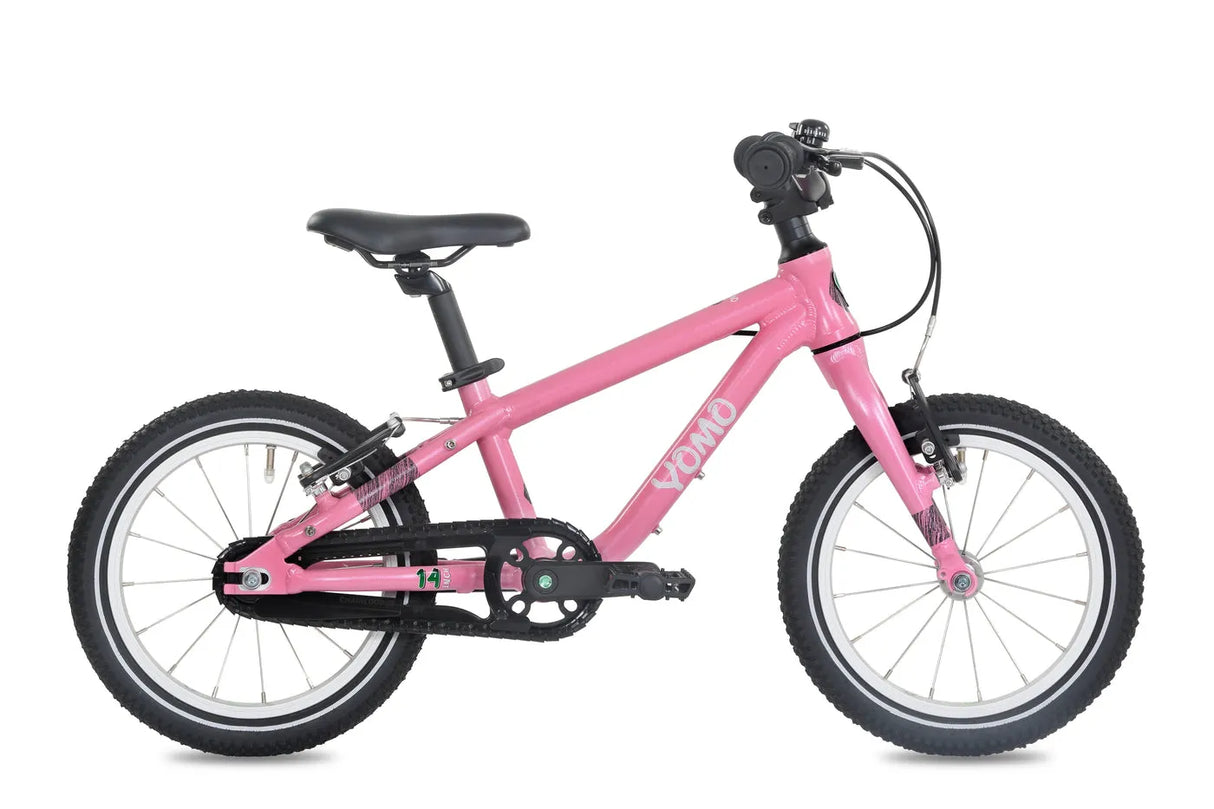 Yomo 14 inch kids bike in pink, side view on a white background