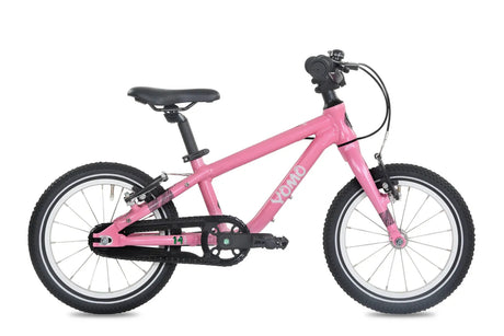 Yomo 14 inch kids bike in pink, side view on a white background