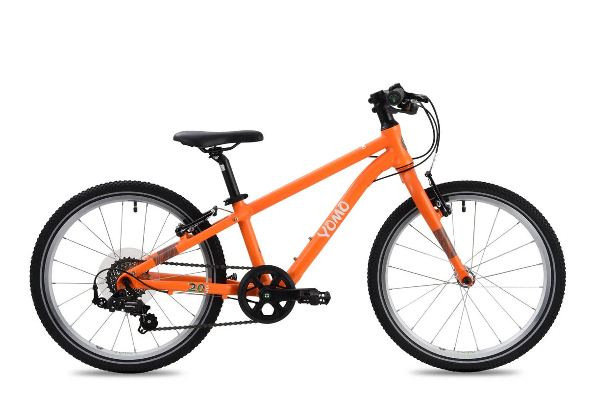 Yomo 20 inch kids bike in orange, side view on a white background