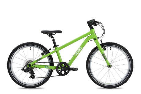 Yomo 20 inch kids bike in green, side view on a white background