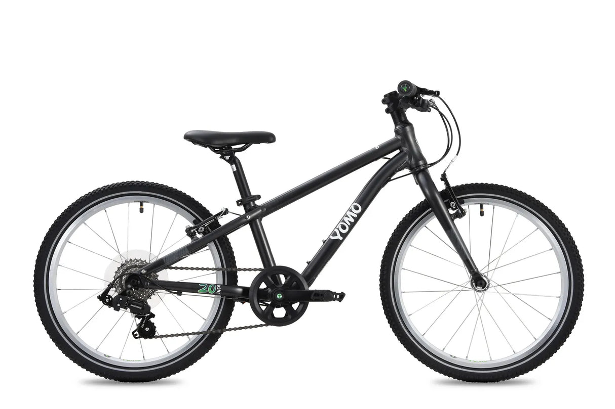 Yomo 20 inch kids bike in black, side view on a white background